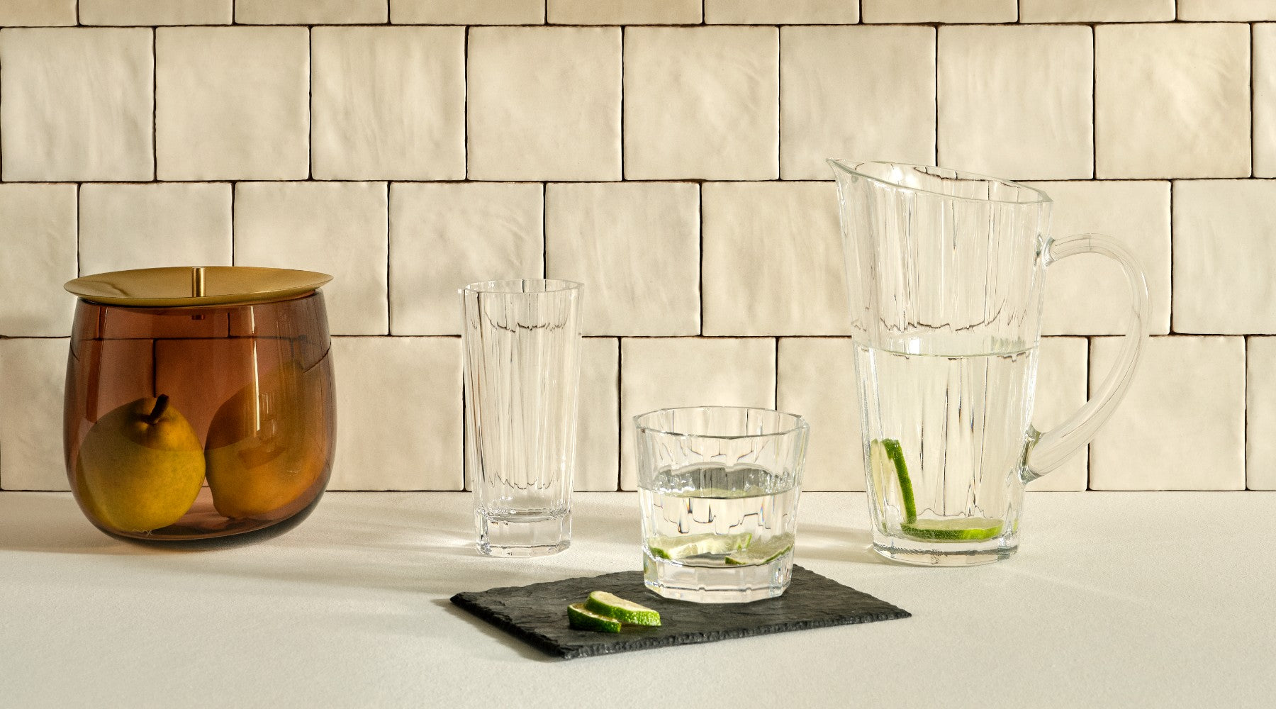 NUDE Hemingway collection existing out of a whisky glass, longdrink glass and jug, presented with the caramel Beret storage box with brass lid