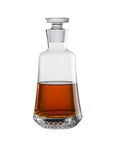 NUDE Paris whisky bottle shaoed with a round base going smaller to the top, inspired by the Eiffel tower. Presented empty on white background