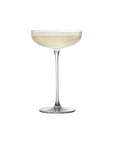 NUDE Savage coupe glass designed by Remy Savage in a clear shot with a sparkling cocktail