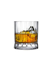 A clear double old-fashioned whiskey glass filled with ice and a golden-brown liquid, showcasing vertical ridges on its surface.