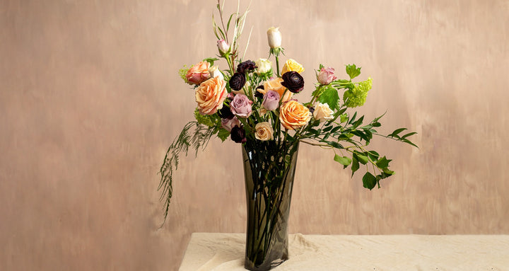 NUDE Inca vase with a mix of flowers in a composition created by florist Grace & Thorn