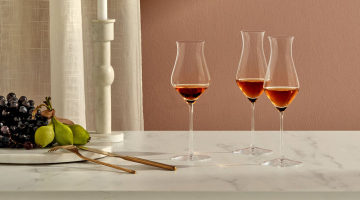 NUDE Islands collection, the medium whisky tasting glass presented with 2 tall whisky tasting glasses on a marble table
