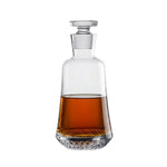 NUDE Paris whisky bottle shaoed with a round base going smaller to the top, inspired by the Eiffel tower. Presented empty on white background