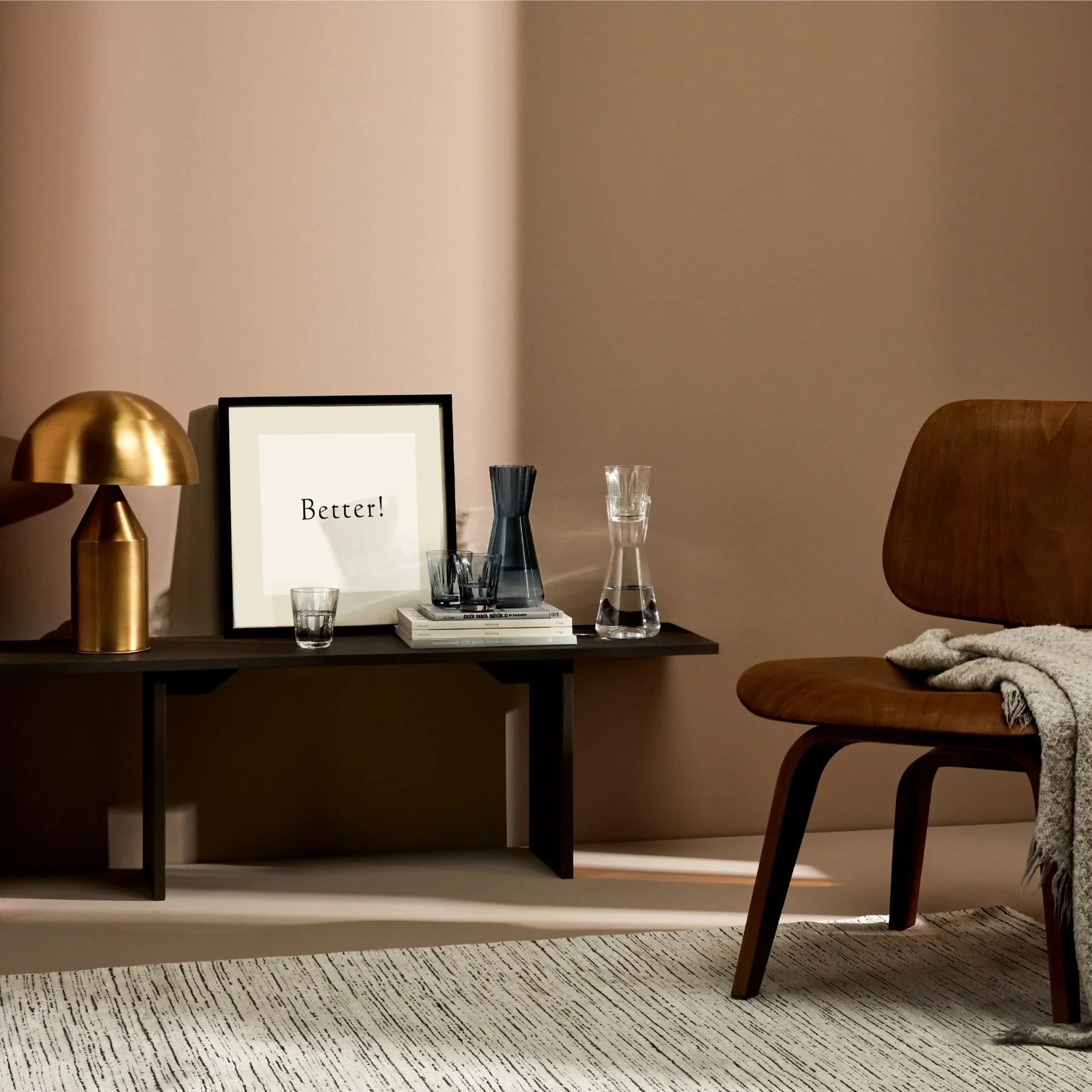 Lifestyle image with NUDE Lady water carafe and water glasses presented on side table 