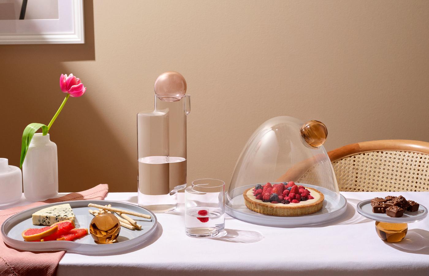 NUDE Juno Water Carafe, Tumblers, Cake Dome and Serving Plates with mini Magnolia Vases on a dessert table