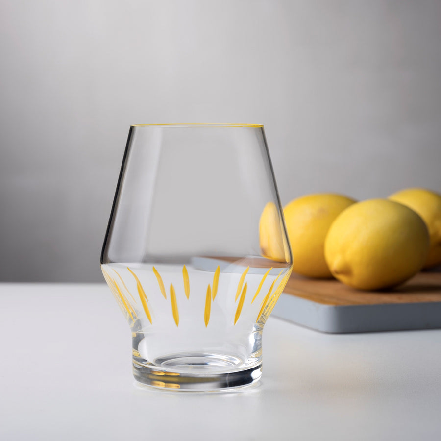 Beak Waterglass Iris Collection Yellow Striped on table setting