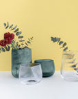 Group Opti Vases by Defne Koz in clear and smoked green